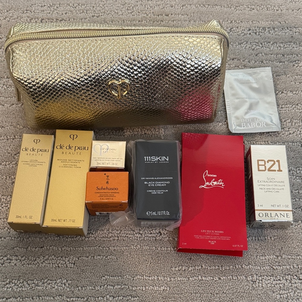 Gold Clutch with Skincare Products